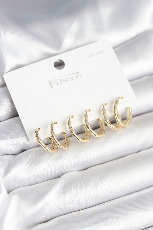 BKP11261 - Pirinç Gold Renk Kemik Halka Model 925 Ayar Gümüş Çivili Kadın Küpe Seti