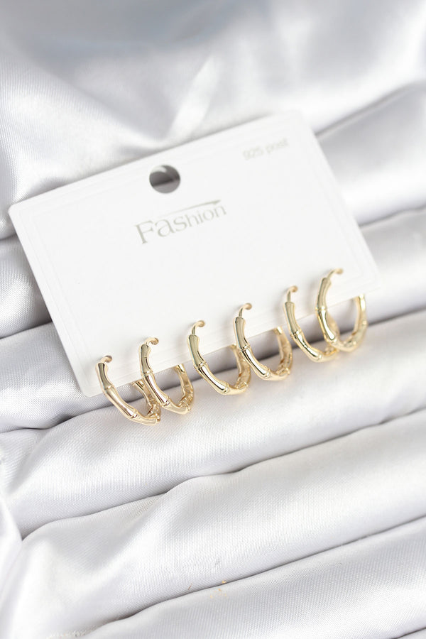BKP11261 - Pirinç Gold Renk Kemik Halka Model 925 Ayar Gümüş Çivili Kadın Küpe Seti