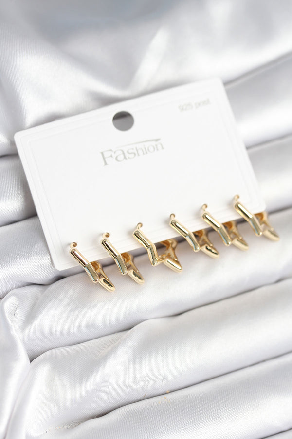 BKP11278 - Yıldız Model Gold Renk 925 Ayar Gümüş Çivili Kadın Küpe Seti