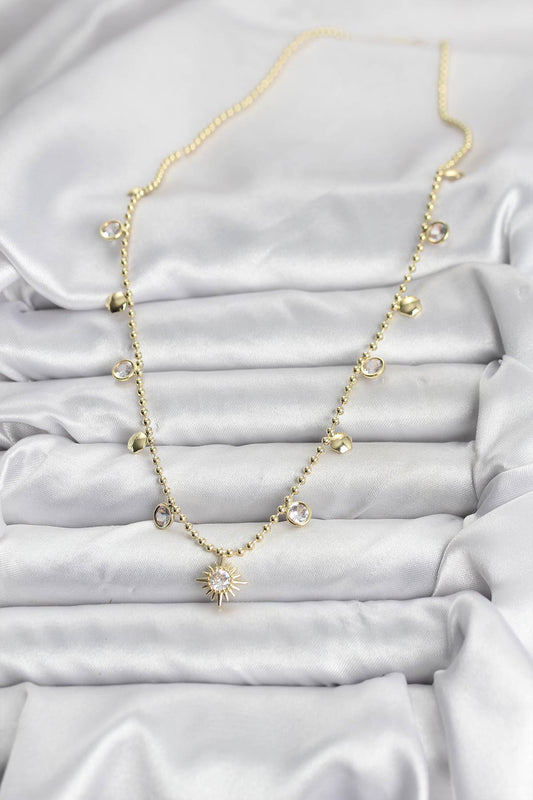 BKO10648 - Zirkon Taşlı Kutup Yıldızı Model Pirinç Gold Renk Kadın Kolye