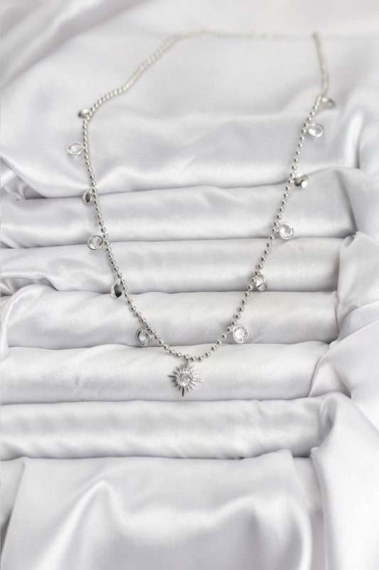 BKO10658 - Zirkon Taşlı Kutup Yıldızı Model Pirinç Gümüş Renk Kadın Kolye