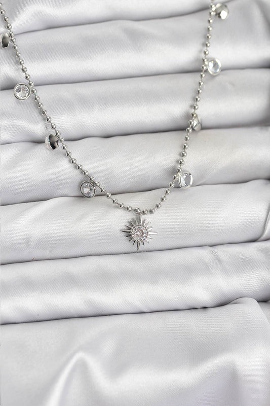 BKO10658 - Zirkon Taşlı Kutup Yıldızı Model Pirinç Gümüş Renk Kadın Kolye